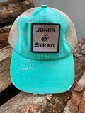 turquoise jones and strait trucker cap