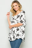 black and white floral babydoll top with ruffle sleeves