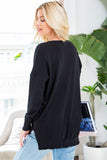 plus size top in black with drop shoulders in our boutique aunt lillie bells