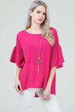 Pink top with ruffle bell sleeves in our boutique aunt lillie bells