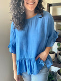 blue ruffle top in our online boutique aunt lillie bells
