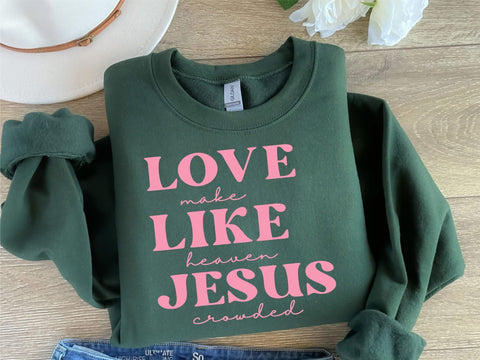 make heaven crowded and love like Jesus sweatshirt in forest green with pink lettering