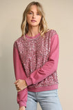 pink sequin sweatshirt in our boutique