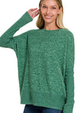 green knit sweater for the holidays in our boutique aunt lillie bells