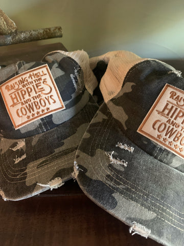 Raising hell with the hippies and the cowboys trucker cap in our boutique