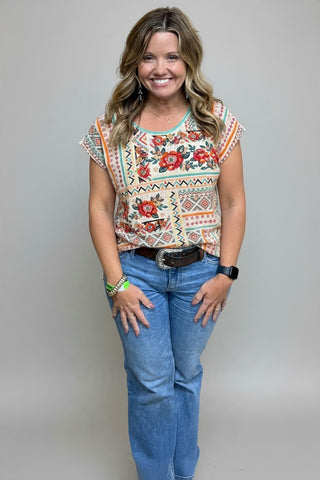 white embroidery resort top