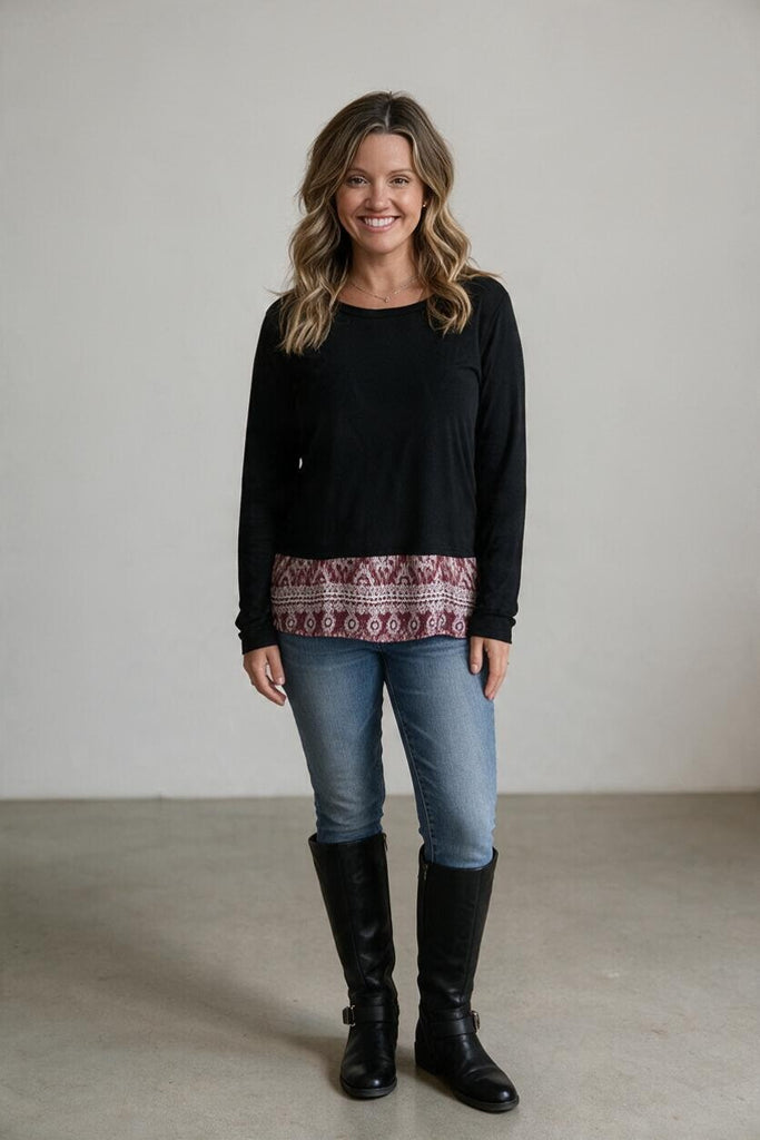 black top with burgundy print hem