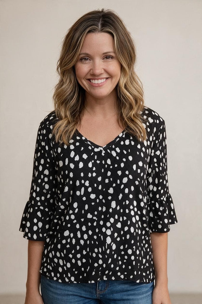 black and white dalmation top with ruffle sleeves