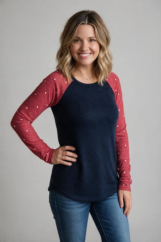 navy sweater with red polka dot sleeves
