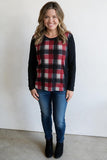 red and black plaid top with black sleeves