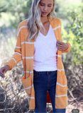 mustard and white striped long cardigan with pockets that is perfect for fall