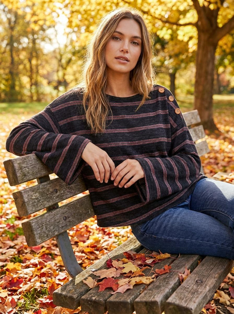 black top with statement sleeves and cute wood button detail