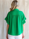 kelly green blouse perfect for work or play in our boutique