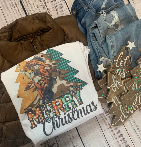 Western Christmas graphic tee in our boutique aunt lillie bells