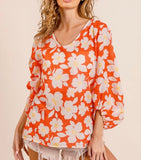summertime floral blouse in orange and white