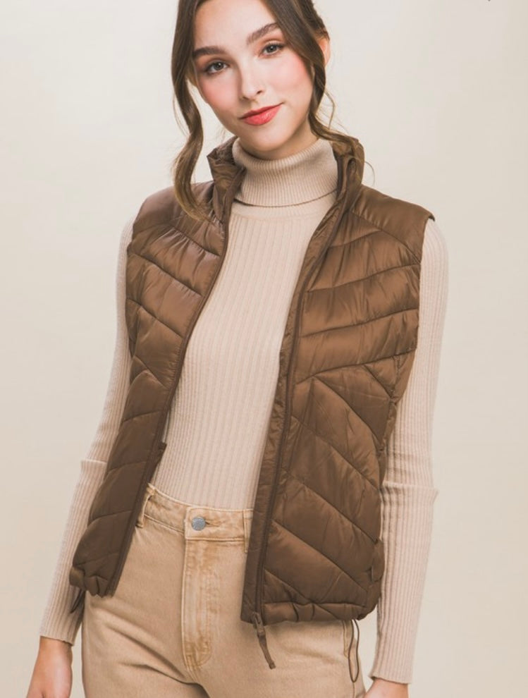 brown puffer vest in our boutique aunt lillie bells
