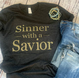sinner with a Savior  Christian graphic tee in our boutique aunt lillie bells