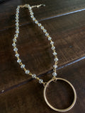 crystal bead and gold circle necklace in our boutique aunt lillie bells