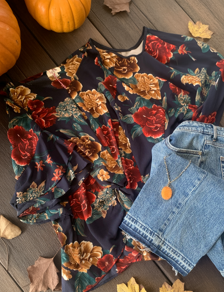 navy floral blouse for fall with twist front from umgee in our boutique