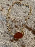 amber stone with a brushed gold chain with a western boho feel in our boutique aunt Lillie bells