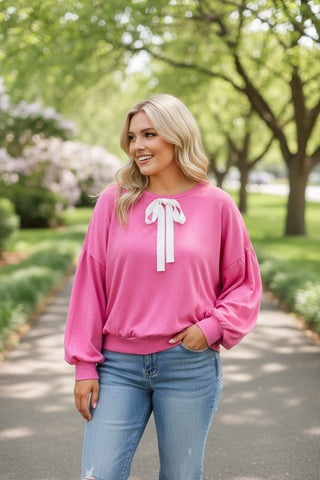pretty in pink, pink top with drop shoulders and cute white bow
