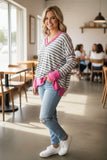 grey and white striped top with pink trim