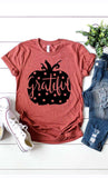 fall graphic tee with a pumpking and polka dots