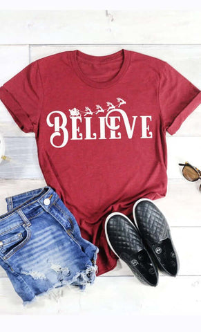 believe Christmas tee in red with white lettering in our boutique aunt lillie bells