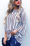 spring stripe top with bell sleeves in our boutique aunt lillie bells