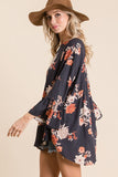 navy floral blouse with ruffle sleeves in our texas boutique aunt lillie bells