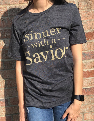 sinner with a savior graphic tee at aunt lillie bells