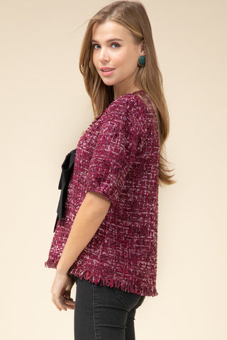 maroon party top with sequins and black bow in our boutique aunt lillie bells