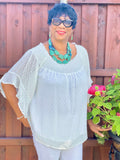white dotted swiss off the shoulder plus size top