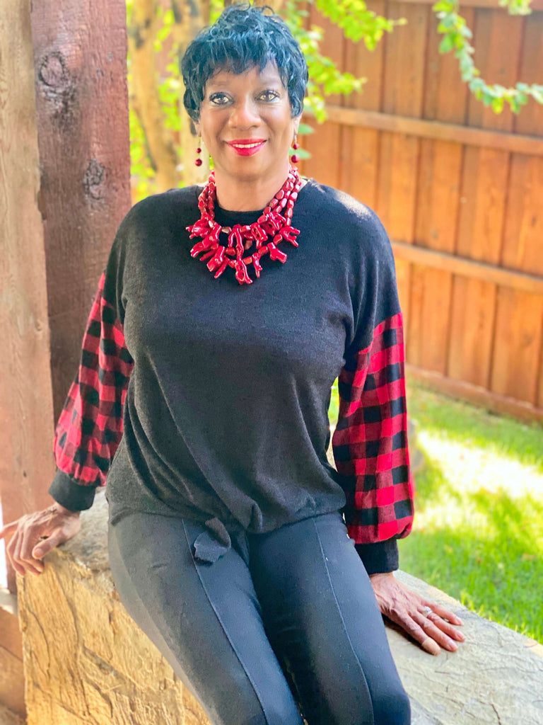 charcoal black top with red and black buffalo plaid sleeves