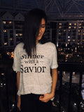 Sinner with a Savior christian tee in our boutique aunt lillie bells