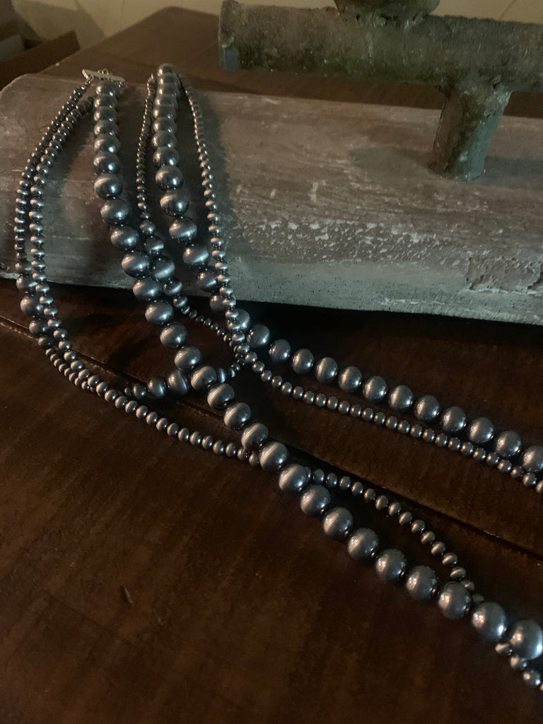 faux triple strand navajo pearl necklace