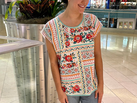 beautiful embroidery top great for spring or summer  and  a great vacation top in our boutique aunt lillie bells