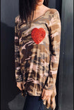 camo top with a red sequin heart in plus sizes