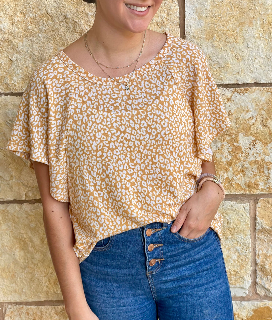 mustard leopard yellow top with ruffle sleeves in our boutique aunt lillie bells