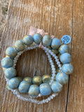 Blue and gold distressed wood bead bracelet for a cute boho look