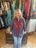 blue top with coral snd red embroidery from Savannah jane