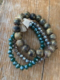 distressed wood beads in gold with teal glass beads
