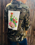 camo top with an embroidered cactus patch on the back