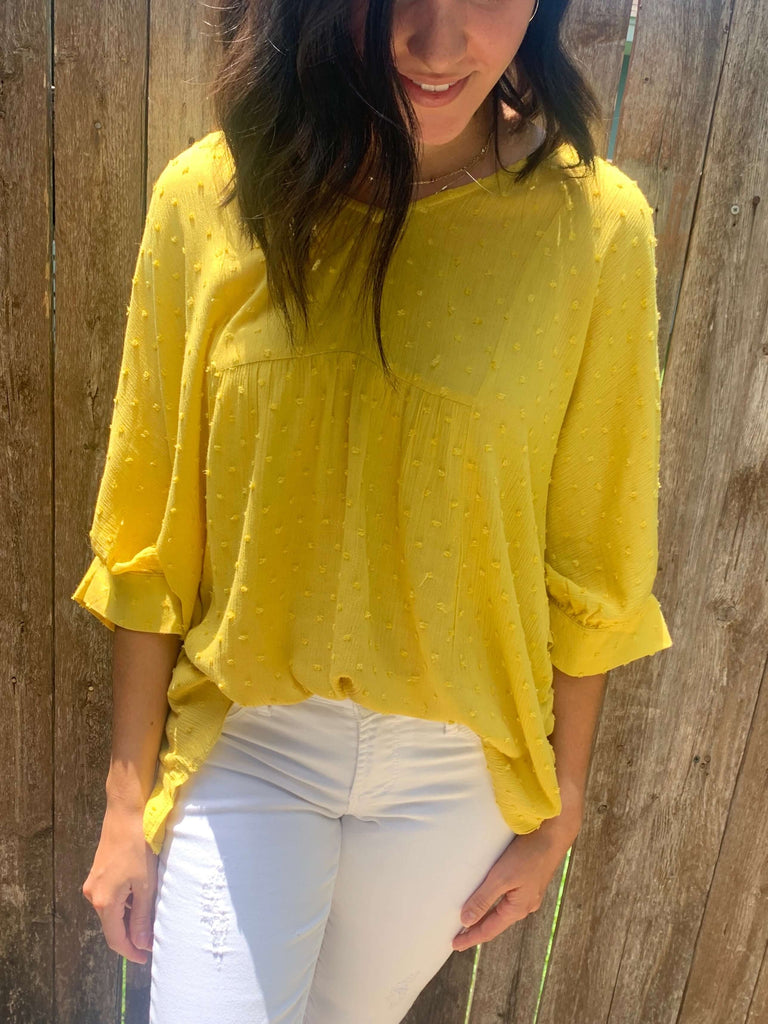yellow baby doll top in dotted swiss in our texas boutique