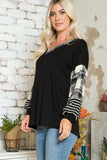 plus size black sweater with white and black plaid sleeves