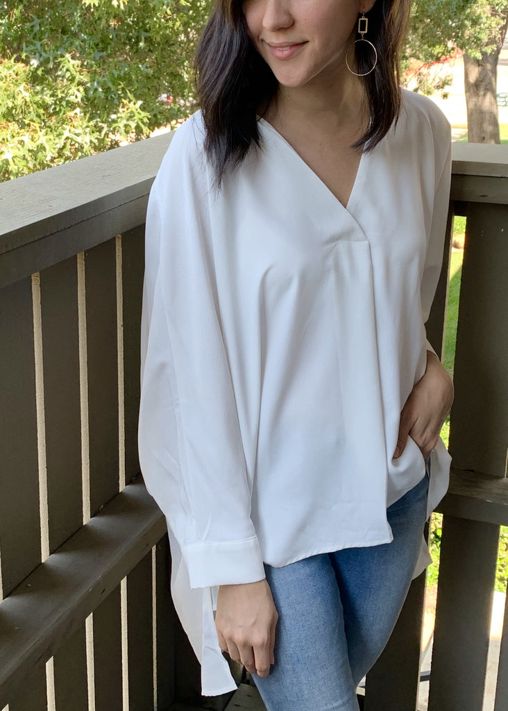 white v-neck blouse in our texas boutique